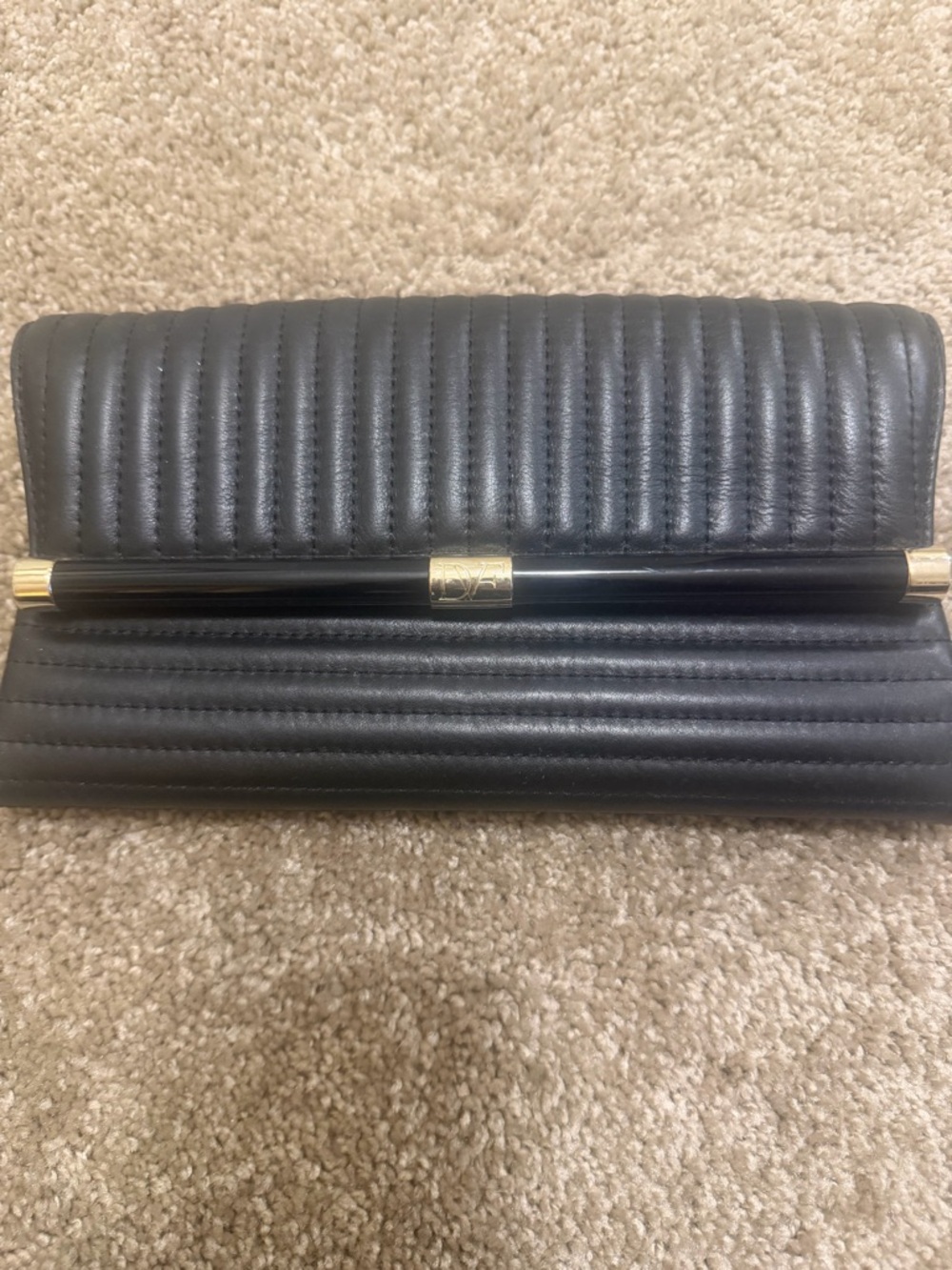 Diane Von Furstenberg Black Quilted Leather Clutch with Gold Accent Bar